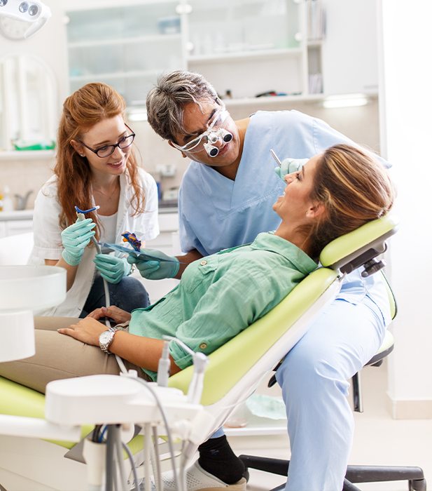 Dentist treating dental patient